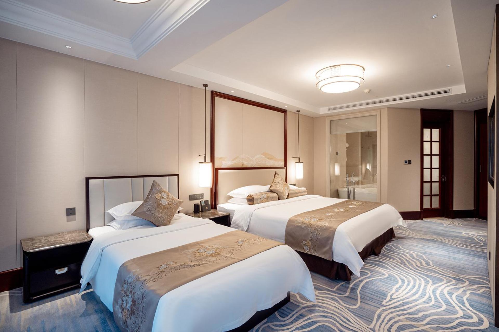 Yancheng Shuicheng Hotel Bagian luar foto