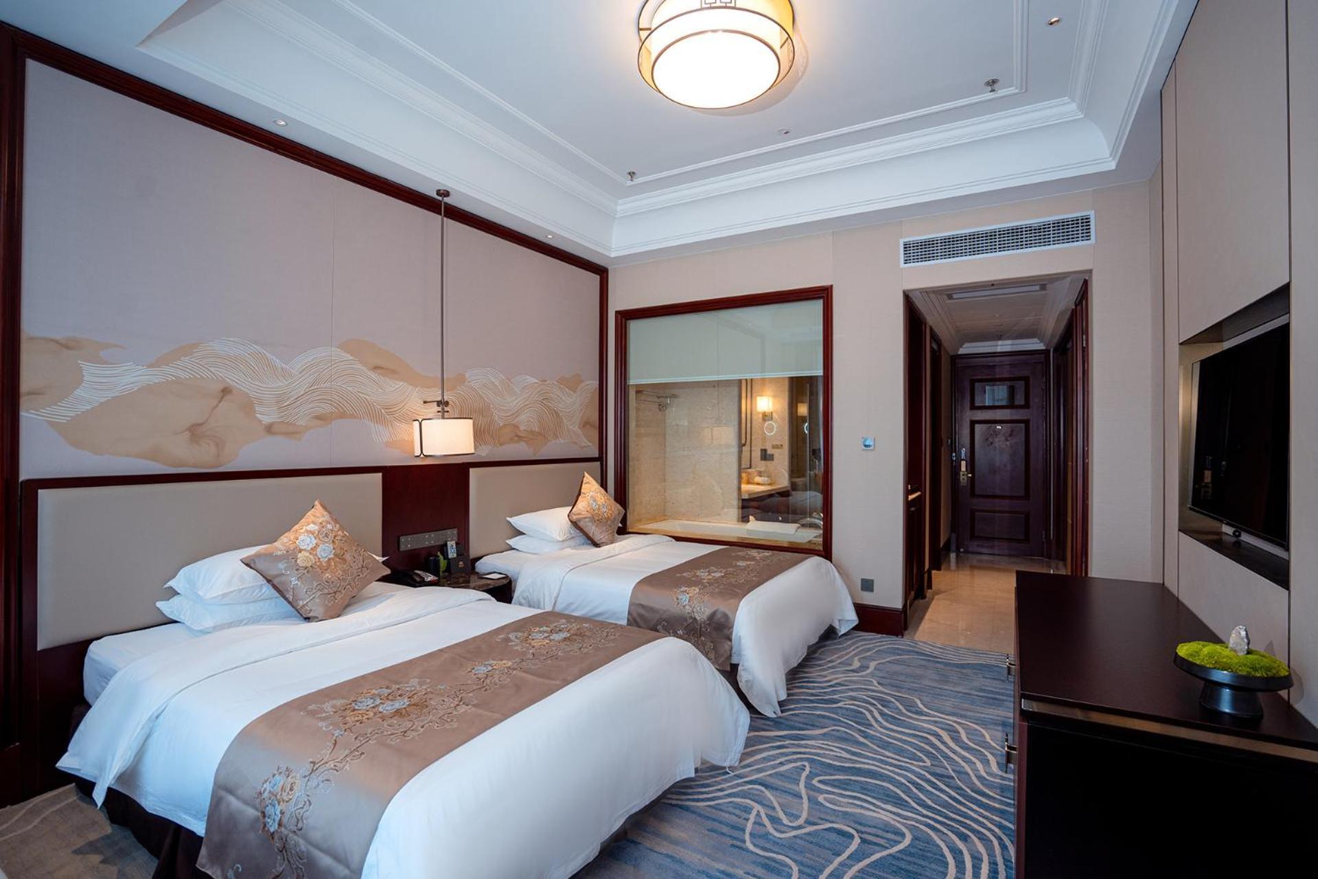Yancheng Shuicheng Hotel Bagian luar foto